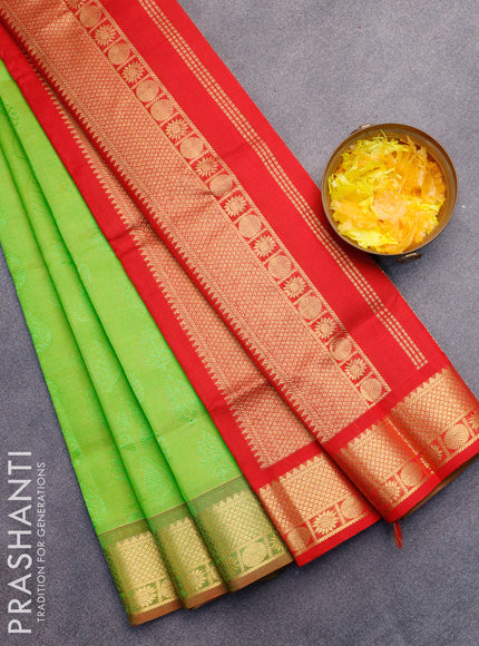 Silk cotton saree dual shade of light green and red with allover self emboss jaquard and zari woven border