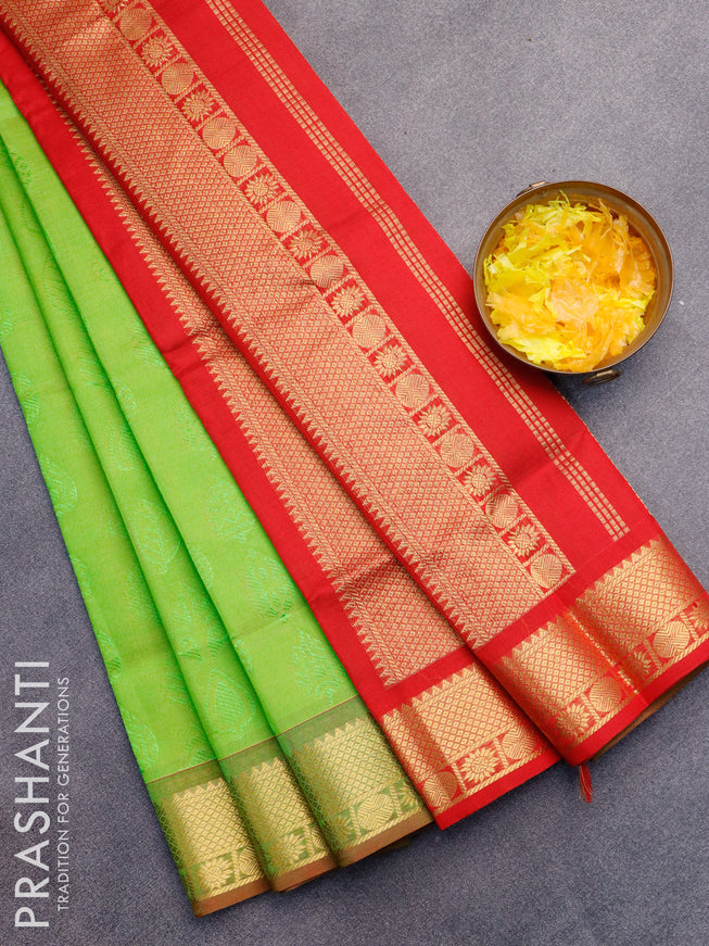 Silk cotton saree dual shade of light green and red with allover self emboss jaquard and zari woven border