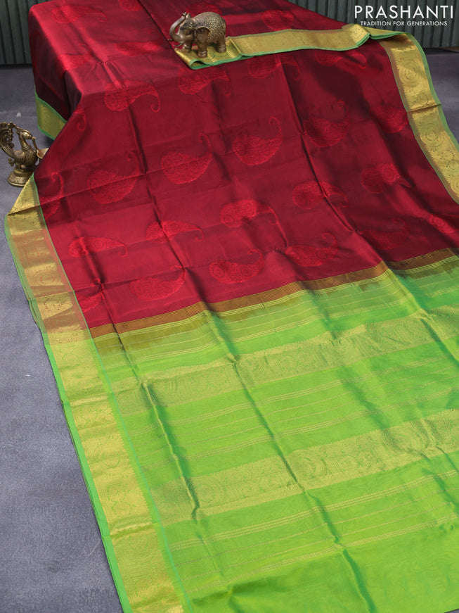 Silk cotton saree maroon and light green with allover self emboss jaquard and zari woven border