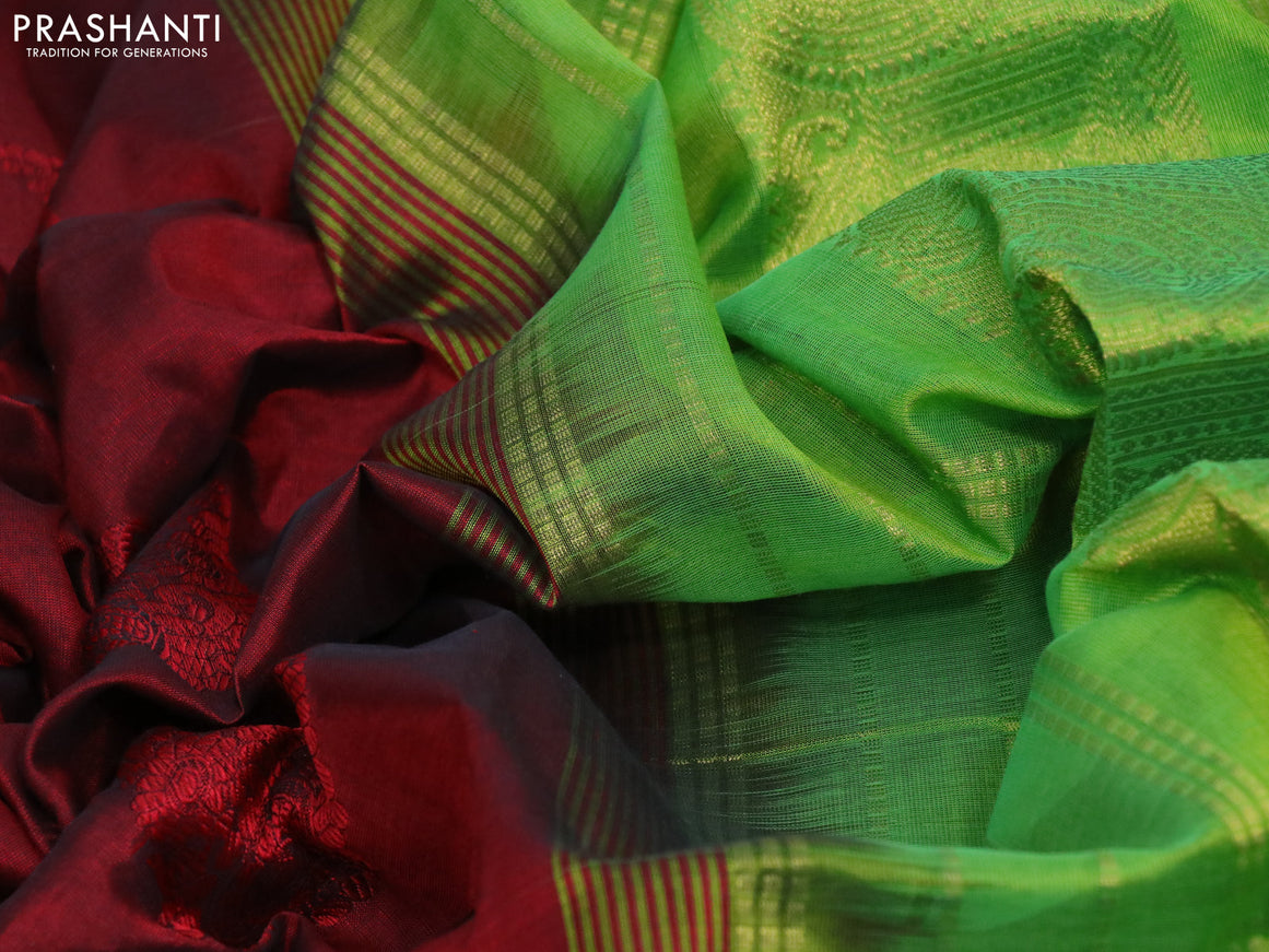 Silk cotton saree maroon and light green with allover self emboss jaquard and zari woven border