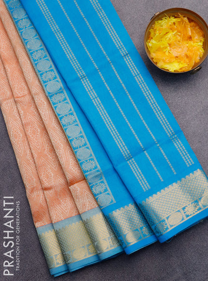 Silk cotton saree pale orange and blue with allover self emboss jaquard and zari woven border