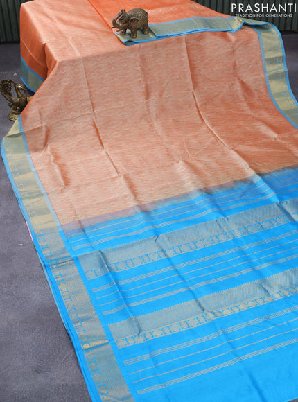 Silk cotton saree pale orange and blue with allover self emboss jaquard and zari woven border