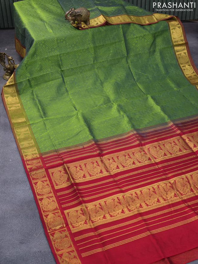 Silk cotton saree dual shade of green and kumkum red with allover self emboss jaquard and annam zari woven border