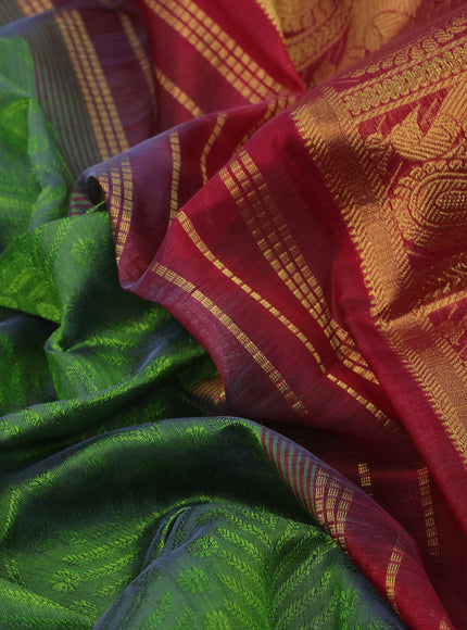 Silk cotton saree dual shade of green and kumkum red with allover self emboss jaquard and annam zari woven border