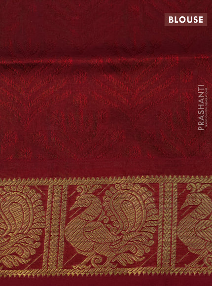 Silk cotton saree dual shade of green and kumkum red with allover self emboss jaquard and annam zari woven border