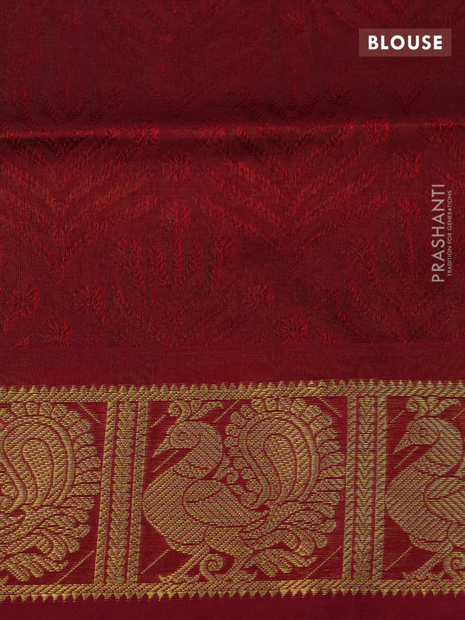 Silk cotton saree dual shade of green and kumkum red with allover self emboss jaquard and annam zari woven border