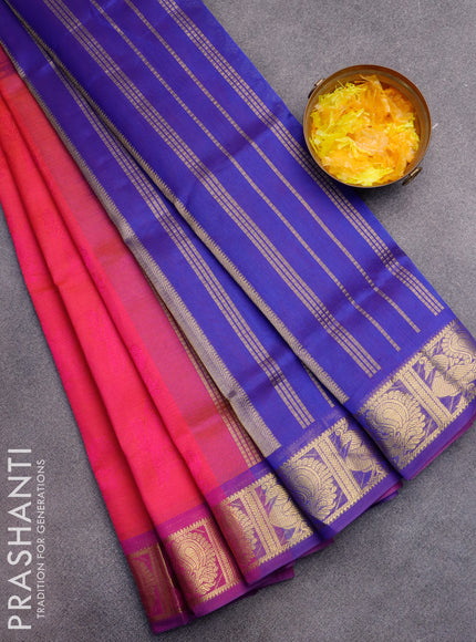 Silk cotton saree dual shade of pinkish orange and blue with allover self emboss jaquard and annam zari woven border