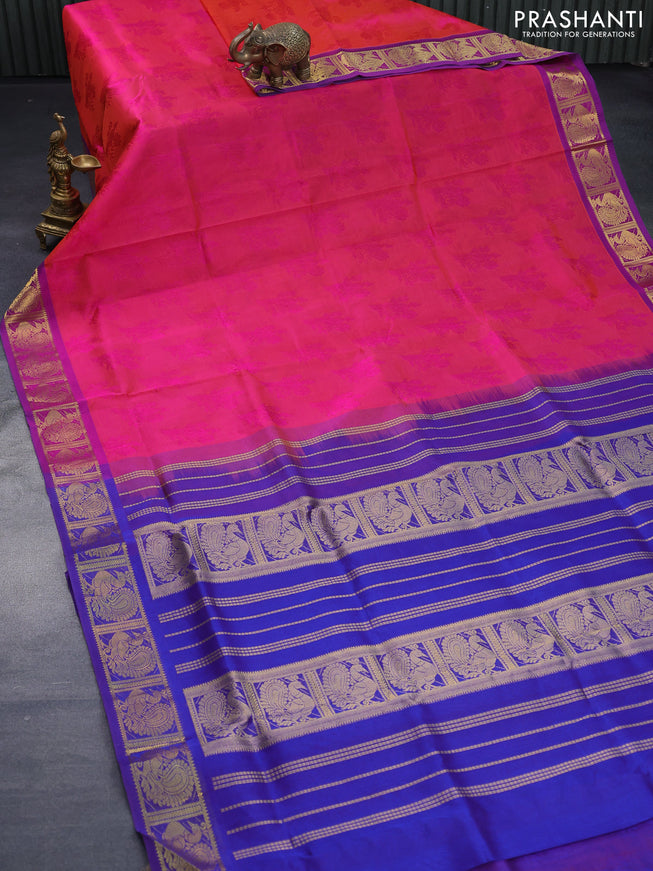 Silk cotton saree dual shade of pinkish orange and blue with allover self emboss jaquard and annam zari woven border