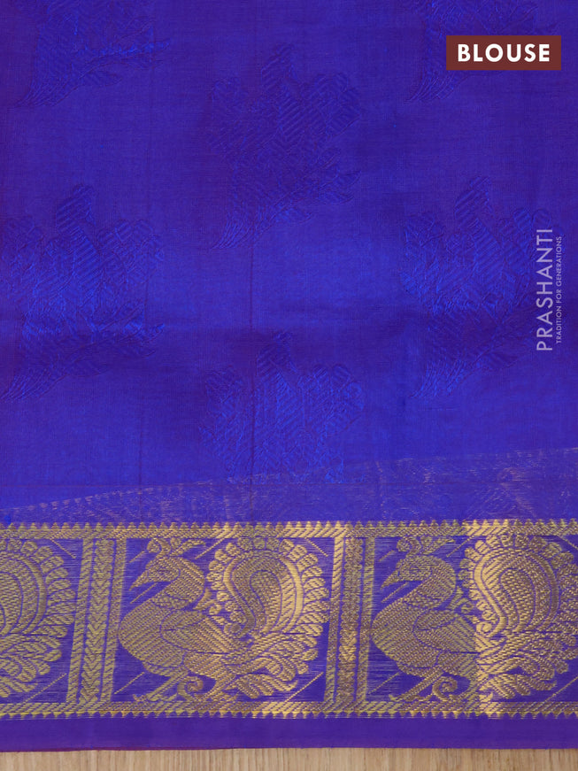 Silk cotton saree dual shade of pinkish orange and blue with allover self emboss jaquard and annam zari woven border