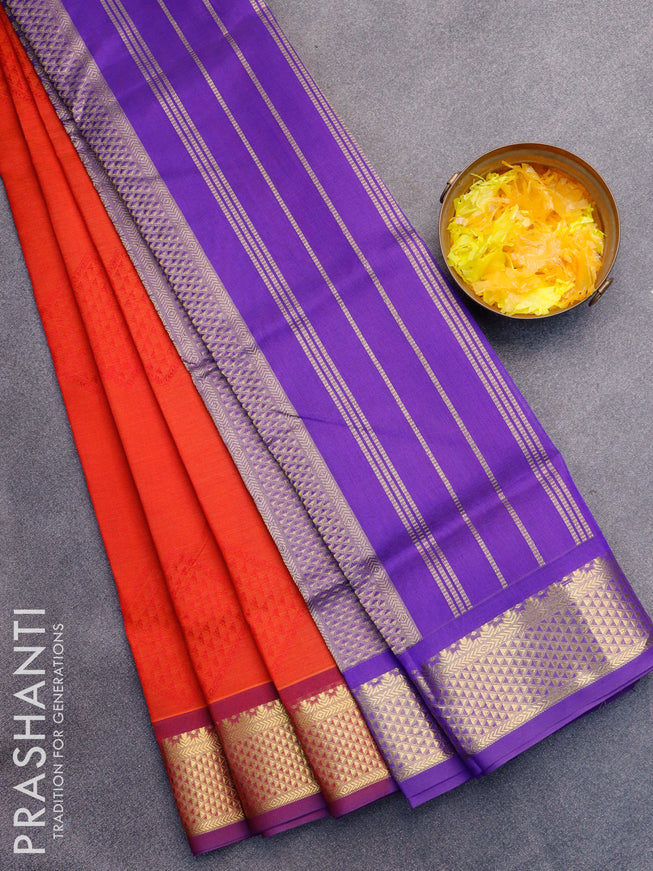 Silk cotton saree rustic orange and blue with allover self emboss jaquard and zari woven border