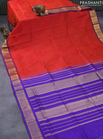 Silk cotton saree rustic orange and blue with allover self emboss jaquard and zari woven border