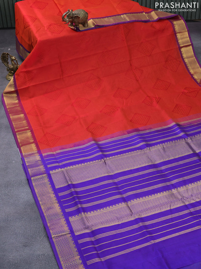 Silk cotton saree rustic orange and blue with allover self emboss jaquard and zari woven border