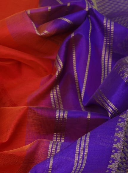 Silk cotton saree rustic orange and blue with allover self emboss jaquard and zari woven border