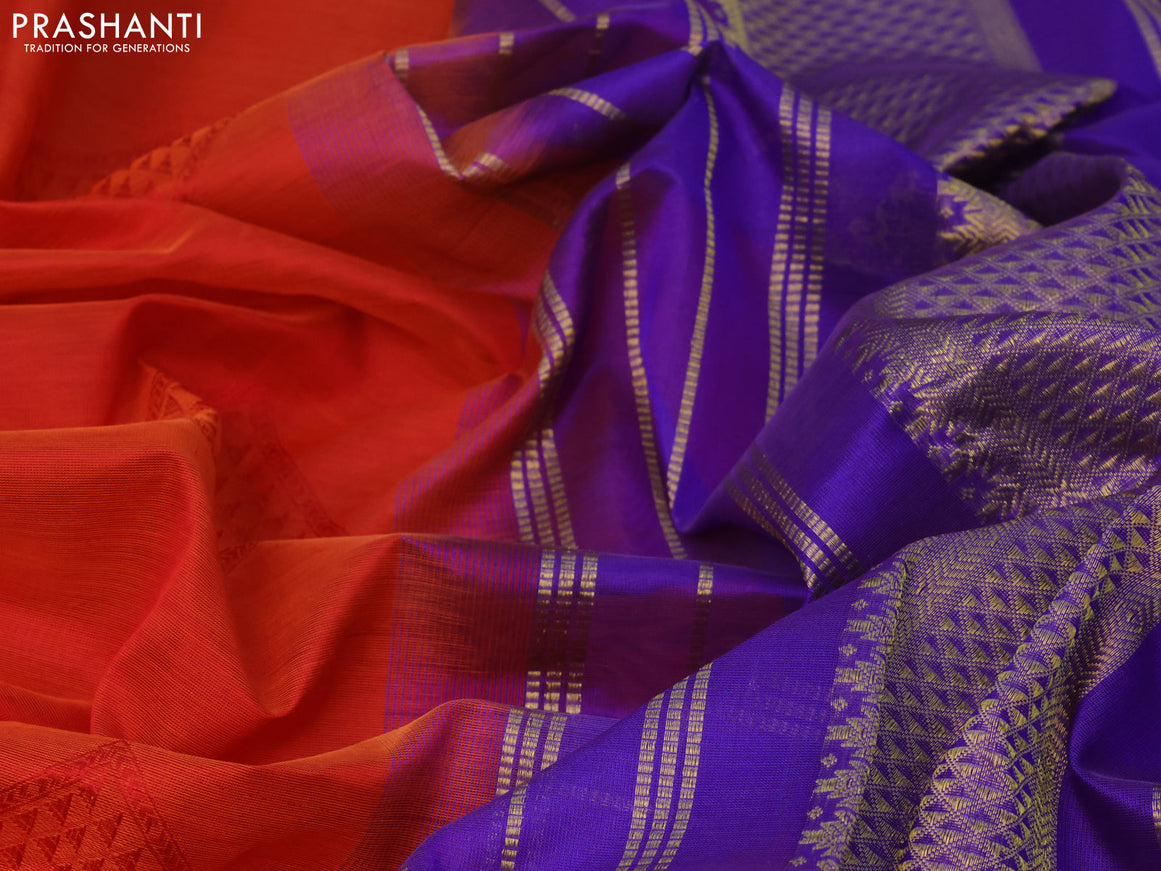 Silk cotton saree rustic orange and blue with allover self emboss jaquard and zari woven border