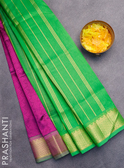 Silk cotton saree purple and green with allover self emboss jaquard and zari woven border