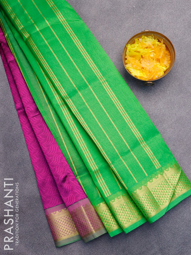 Silk cotton saree purple and green with allover self emboss jaquard and zari woven border