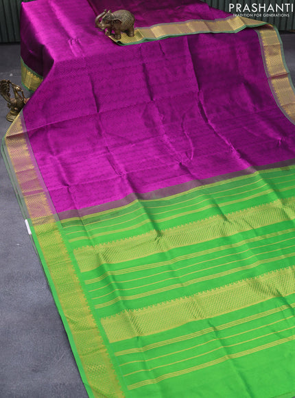 Silk cotton saree purple and green with allover self emboss jaquard and zari woven border