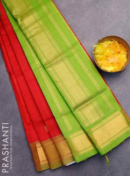 Silk cotton saree red and light green with allover zari woven buttas and zari woven border