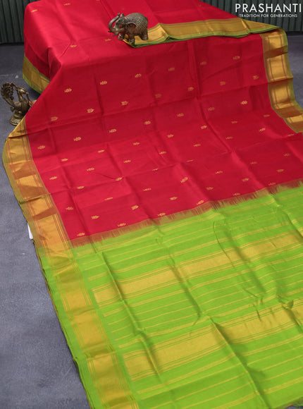 Silk cotton saree red and light green with allover zari woven buttas and zari woven border