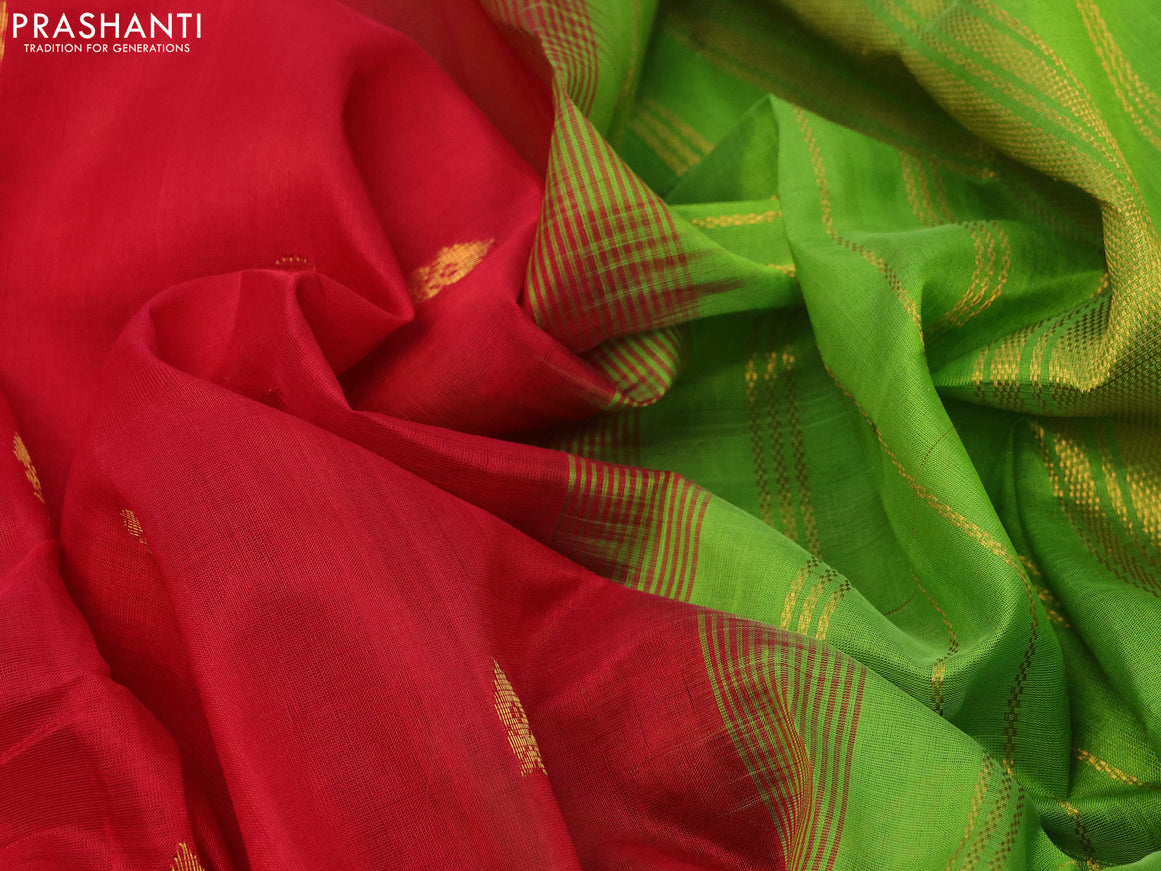 Silk cotton saree red and light green with allover zari woven buttas and zari woven border