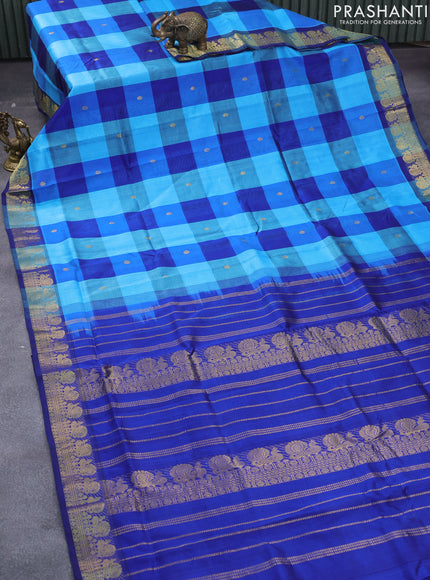 Silk cotton saree light blue and blue with allover paalum pazhamum checked pattern & zari buttas and annam zari woven border