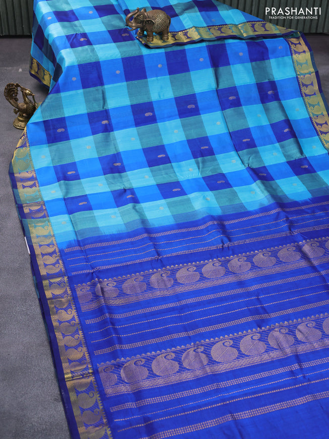 Silk cotton saree light blue and blue with allover paalum pazhamum checked pattern & zari buttas and annam zari woven border