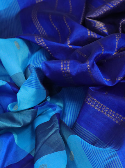 Silk cotton saree light blue and blue with allover paalum pazhamum checked pattern & zari buttas and annam zari woven border