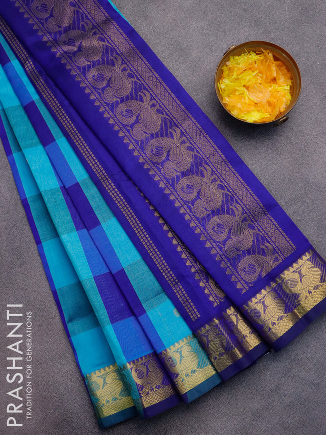 Silk cotton saree light blue and blue with allover paalum pazhamum checked pattern & zari buttas and annam zari woven border