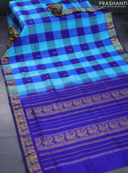 Silk cotton saree light blue and blue with allover paalum pazhamum checked pattern & zari buttas and annam zari woven border