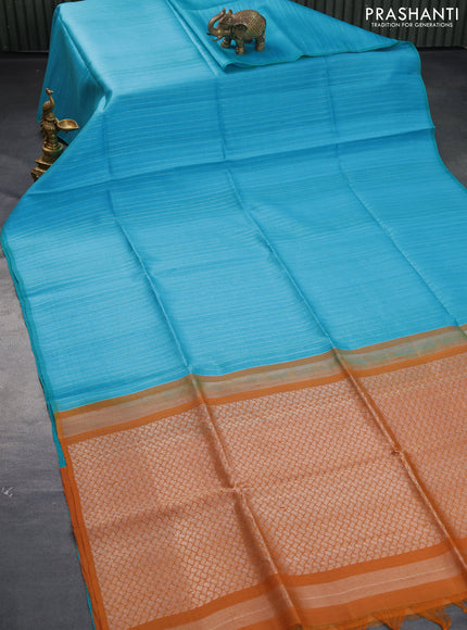 Pure raw silk saree light blue and drak mustard with allover silver zari weaves in borderless style