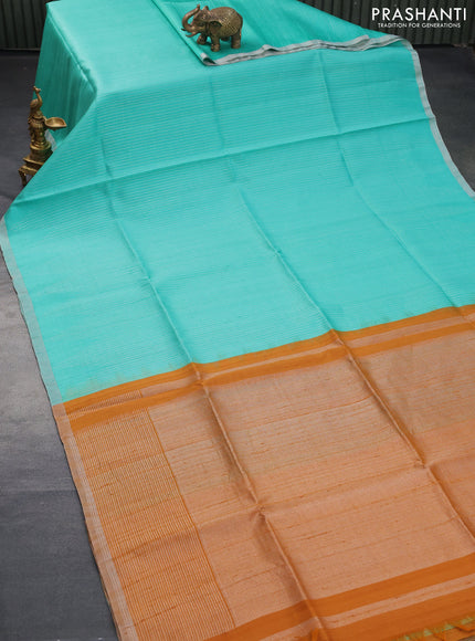 Pure raw silk saree teal blue and mustard yellow with allover silver zari weaves in borderless style