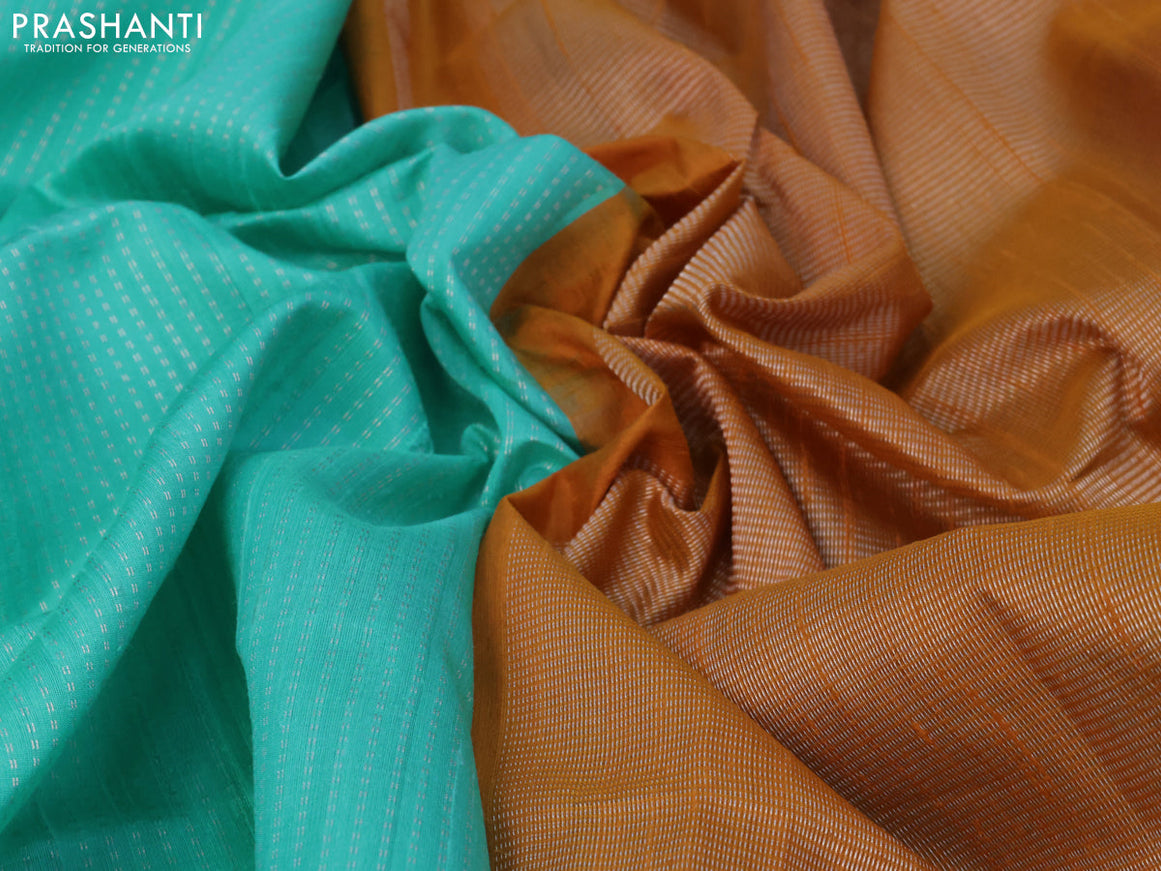 Pure raw silk saree teal blue and mustard yellow with allover silver zari weaves in borderless style