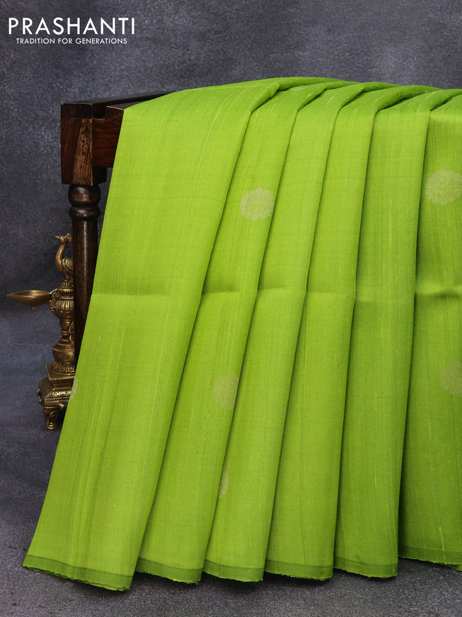 Pure raw silk saree light green and light pink with silver zari woven buttas in borderless style