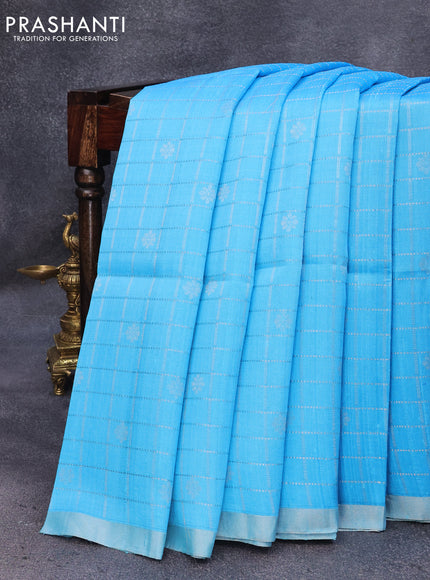 Pure raw silk saree light blue and light pink with allover silver zari checks & buttas and silver zari woven piping border