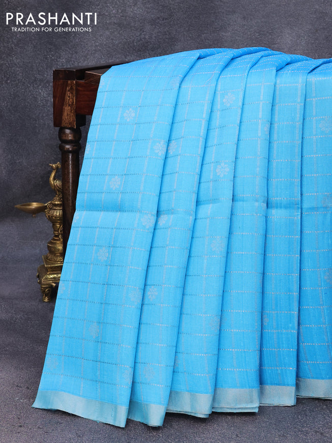 Pure raw silk saree light blue and light pink with allover silver zari checks & buttas and silver zari woven piping border