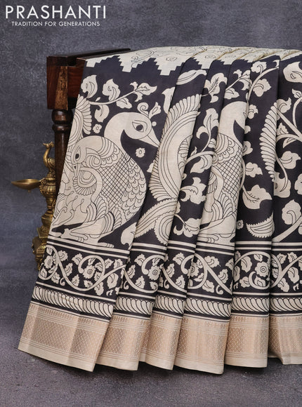 Semi raw silk saree cream and black with allover kalamkari prints and zari woven border