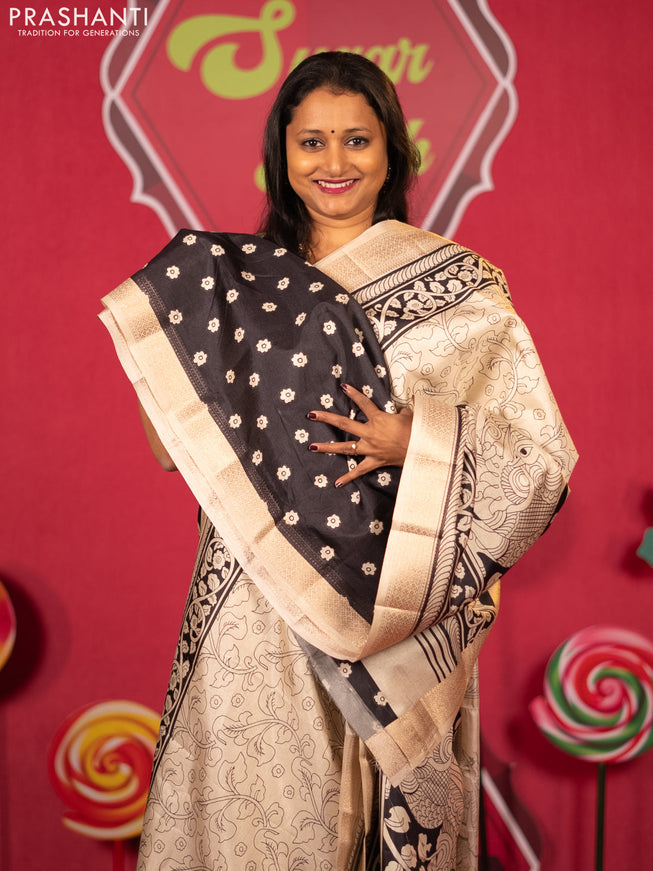 Semi raw silk saree cream and black with allover kalamkari prints and zari woven border