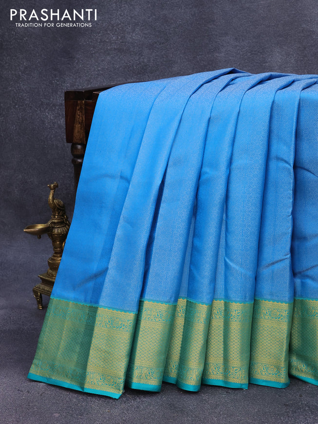 Pure kanjivaram silk saree cs blue and teal green with allover self emboss and zari woven border