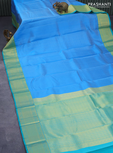 Pure kanjivaram silk saree cs blue and teal green with allover self emboss and zari woven border