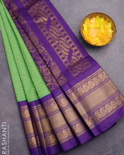 Gadwal cotton saree light green and violet with allover checked pattern and long annam zari woven korvai border without blouse