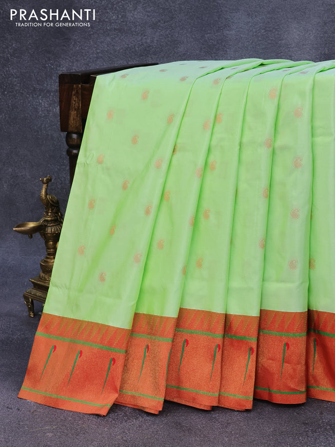 Pure paithani silk saree pista green and red with allover paisley zari woven buttas and zari woven muniya butta border