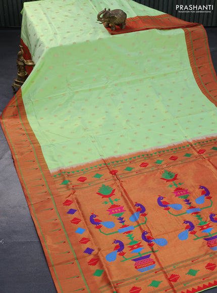 Pure paithani silk saree pista green and red with allover paisley zari woven buttas and zari woven muniya butta border