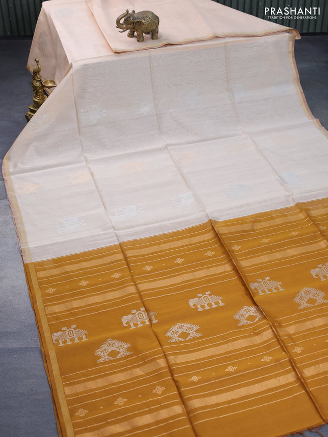 Kora silk cotton saree cream and mustard shade with zari woven buttas and zari woven piping border