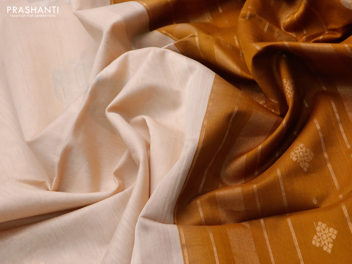 Kora silk cotton saree cream and mustard shade with zari woven buttas and zari woven piping border