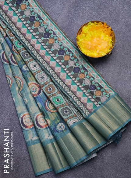 Semi matka saree teal blue with allover geometric prints and zari woven border