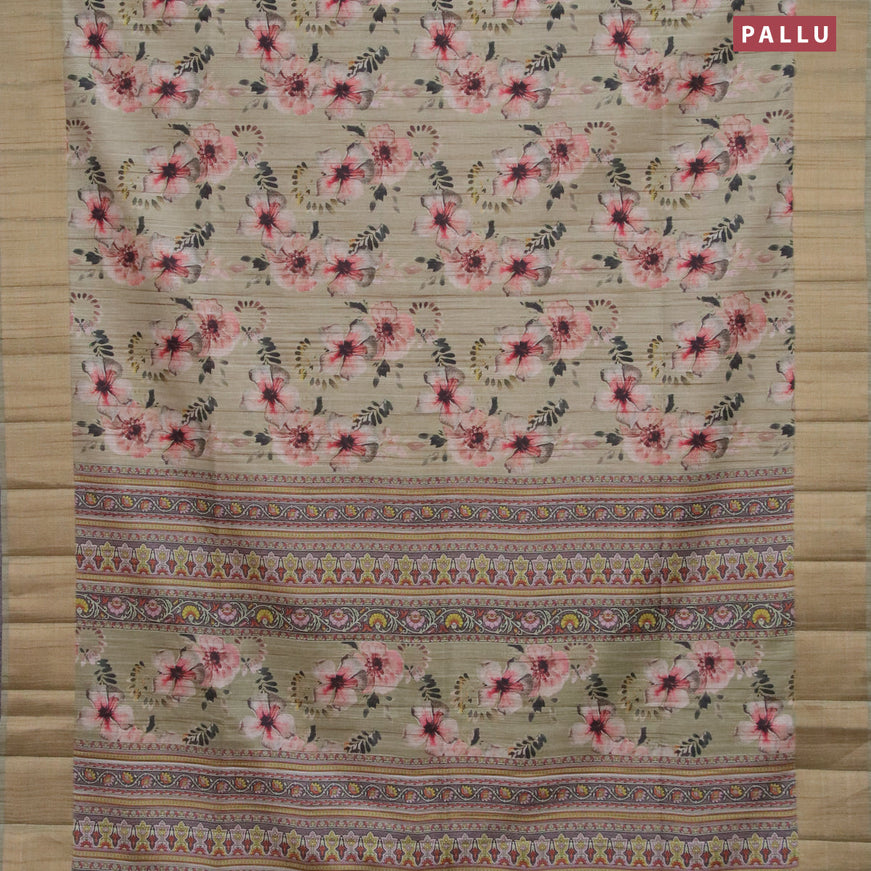 Semi matka saree pastel green with allover floral prints and zari woven border