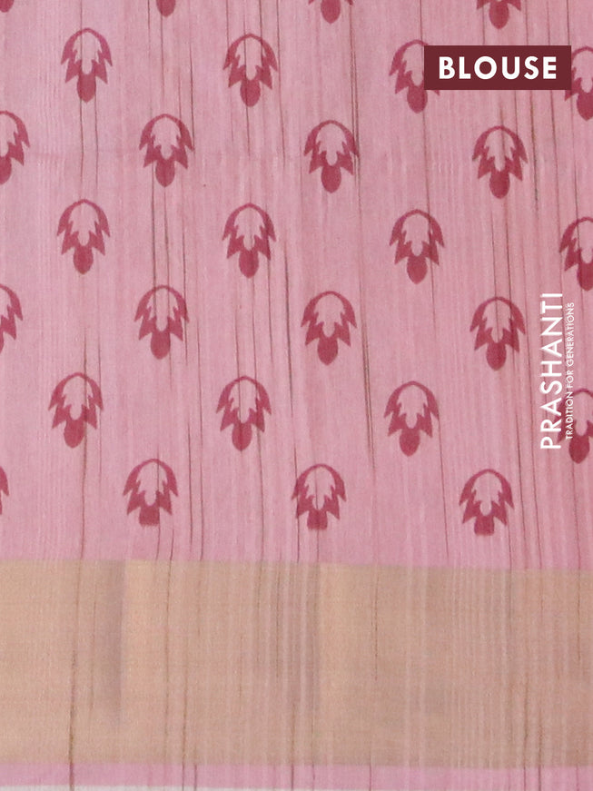 Semi matka saree pastel peach and light pink with allover prints and zari woven border