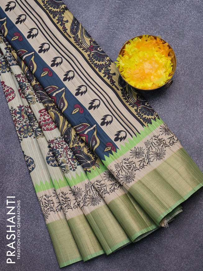 Semi matka saree beige and green with allover prints and zari woven border