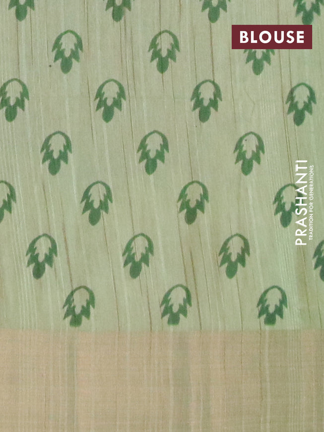 Semi matka saree beige and green with allover prints and zari woven border