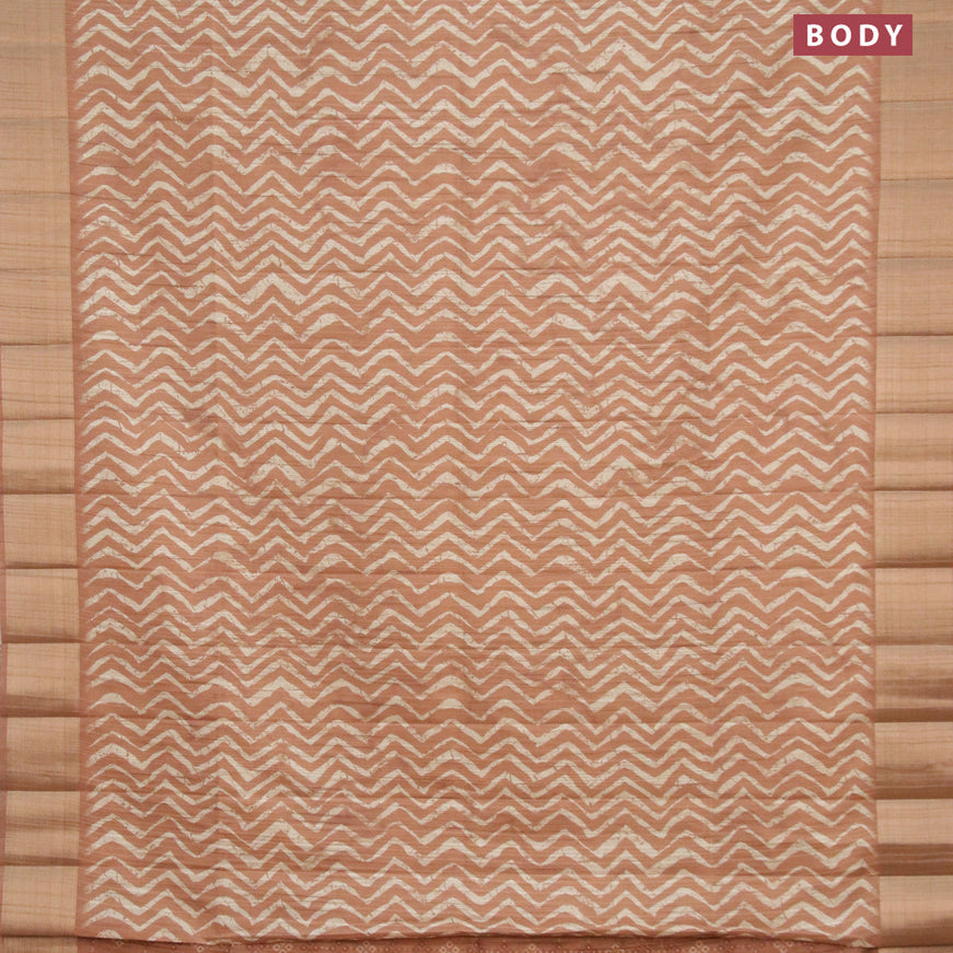 Semi matka saree dark sandal and beige with allover zig zag prints and zari woven border